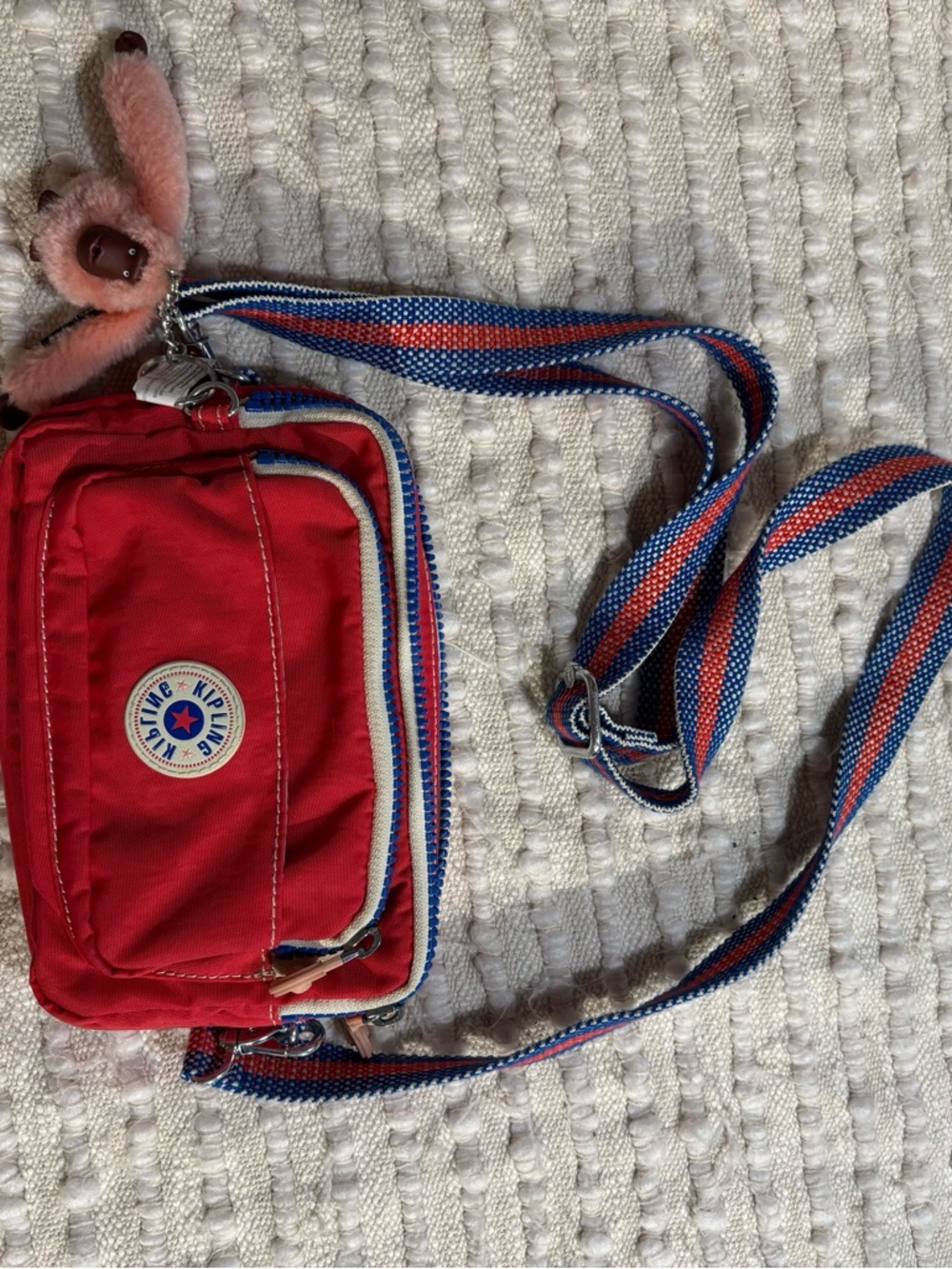 Kipling Red Crossbody with Blue-Red-White Striped Strap